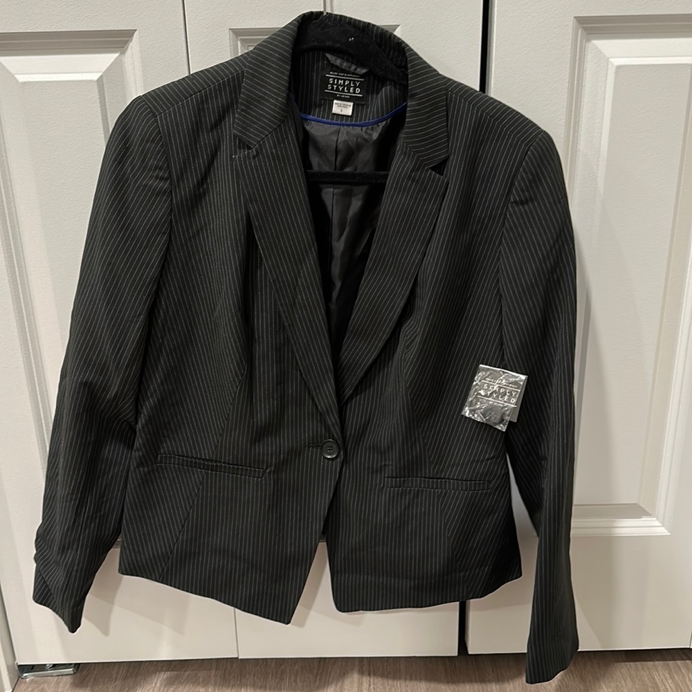 Brand new striped black blazer. Size L